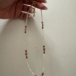 Elegant Beaded Necklace with steel Gold Accents